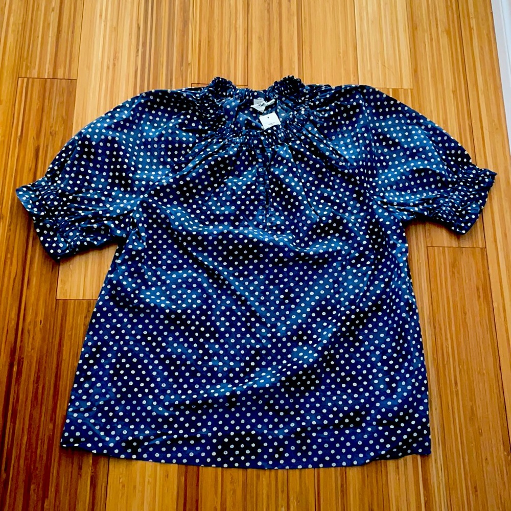 Polka dot top. Great for casual wear.